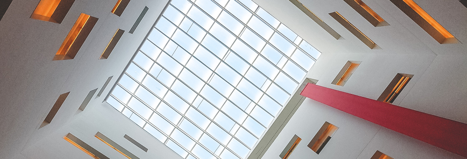 upwards shot of a skylight window in a building